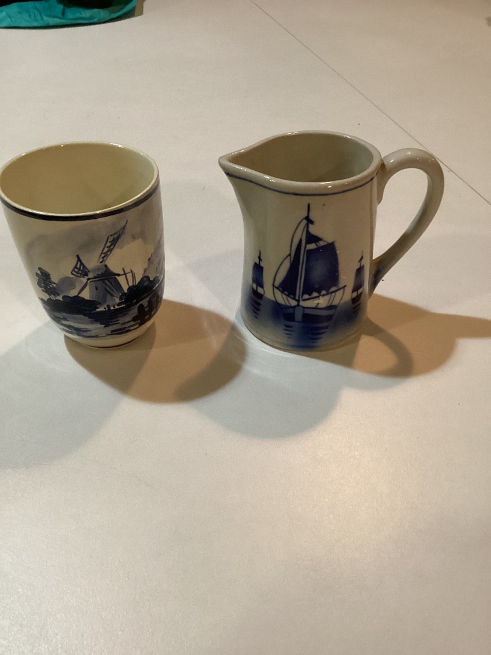 Set of Delftware accessories. Small pitcher/creamer and Cup/ jar